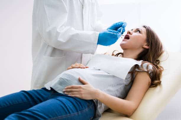 pregnancy hormones leading to oral health problems